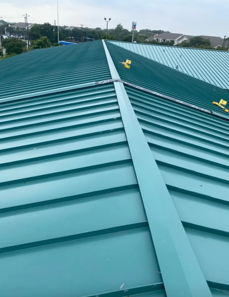 Green commercial metal roof ridge and valley for Metal Roof Repair in Port Neches